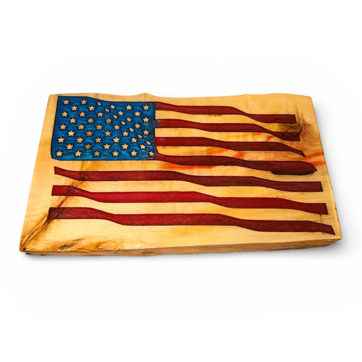 Handcrafted 2-inch thick live edge wood American flag with waving mica powder inlay and high-gloss resin finish.
